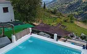 Cortijo en Bubion Casa Ibero Slow Alojamiento turistico rural VTAR GR 00516/ 00555